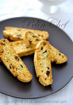 several pieces of bread on a black plate