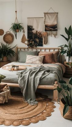 a bedroom with plants and rugs on the floor