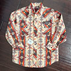 Modern Fit Snap Up Shirt In Tan Aztec Print. Pearl Snap Shirts Women Outfit Western, Western Style White Shirt For Fall, White Western Shirt For Fall, Multicolor Cotton Western Shirt, Multicolor Cotton Tops For Rodeo, Multicolor Casual Shirt For Rodeo, Western Button Up Shirts Woman, Vintage Western Fashion, Western Sweaters