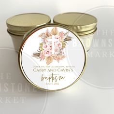 two small tins with wedding favors on them