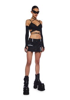 This top has a stretchy knit construction, a strappy wrap around design, lace-up self-tie back closures, adjustable shoulder straps, and attached long sleeves with thumbhole cuffs. Techno Outfit Rave Berlin, Cyberpunk Fashion Women Street Styles, Dark Techno Outfit, Berlin Rave Outfit, Edgy Rave Outfit, Techno Party Outfit Rave, Goth Festival Outfit, Grunge Rave Outfits, Berghain Outfit