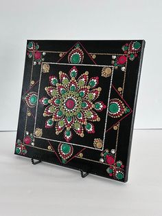 a black box with colorful designs on it