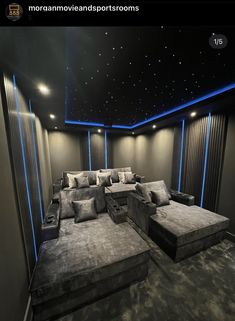 a home theater with couches and pillows