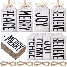 four tags with the words merry written on them and tied in twine to each other