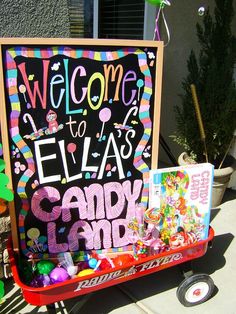 a sign that says welcome to ella's candy land