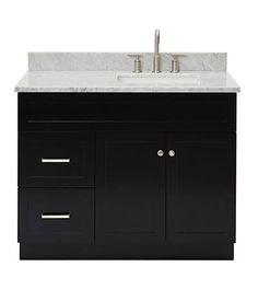 a bathroom vanity with marble top and two faucets on the sink, against a white background