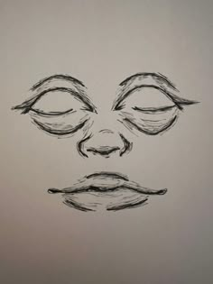 a drawing of a face with eyes closed