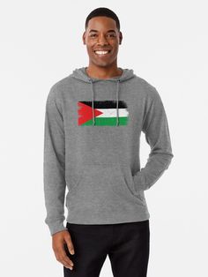 a man wearing a hoodie with the flag of jordan