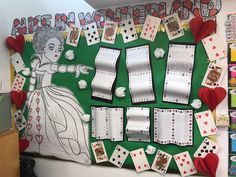 a bulletin board with playing cards on it