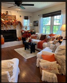 a living room filled with furniture and a fire place