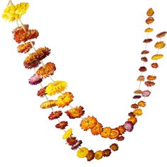 an image of a necklace made with flowers on the end of each beaded strand