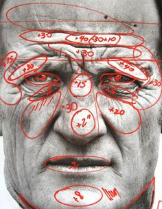 a drawing of a man's face with red lines on it and numbers drawn all over his face