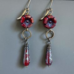 Dark Red Earrings - Dark Red Czech Glass Teardrops dangle fromTwisted Antiqued Brass Rings and Dark Red Czech Glass Flower Beads.  The Teardrops have a Picasso finish. Antiqued Brass  Earwires Earrings measure2.5" from top of earwires to bottom of beads. Red Flower Drop Earrings, Unique Red Flower Earrings, Red Hypoallergenic Flower Earrings For Gift, Hypoallergenic Red Flower Earrings, Czech Glass Dangle Flower Earrings With Ear Wire, Red Flower Shaped Earrings With Ear Wire, Red Flower-shaped Earrings With Ear Wire, Red Bohemian Dangle Flower Earrings, Red Czech Glass Jewelry