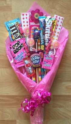 a pink bag filled with lots of candy