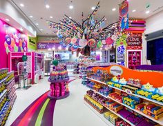 the inside of a candy store filled with lots of colorful candies