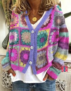 a woman wearing a colorful crochet cardigan sweater