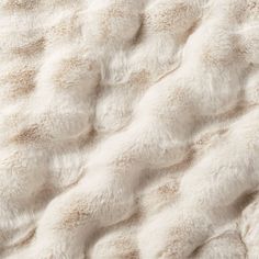 the texture of a white fur blanket