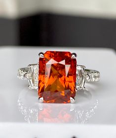 Luxury Orange Sterling Silver Jewelry, Orange Brilliant Cut Jewelry For Gift, Elegant Orange Emerald Cut Jewelry, Luxury Radiant Cut Red Ring, Orange Emerald Cut Jewelry For Anniversary, Orange Engagement Ring, Saphir Ring, Red Sapphire, Vintage Cocktail Ring