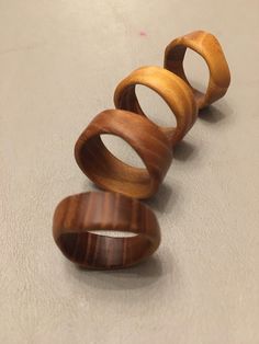 "These gorgeous wood rings are made out of the toughest tight grain hardwood in the USA, Osage Orange.  These wooden rings would make a great gift for a friend, anniversary gift, gift for him or gift for her.  Sizes 3-12 with an average width of .4\" and thickness of .125\".   Irregulars have more of an organic and natural feel to them.  The irregularity pertains to the varying  thickness/thinness of the width.  They are not irregular in size and circular fit.  If by chance a ring breaks from being of natural substance, simply send a picture my way and a replacement will be shipped the next day.    ------------------ Delivery dates are an estimate only and don't come back with a money back guarantee.  The dates are based on USPS Service Standards, your selected Ship Date and Mailed From ZI Wood Ring Men, Don't Come Back, Mens Wood Rings, Friend Anniversary, Orange Wood, Ring Men, Ring Mens, Wood Ring, Thumb Ring