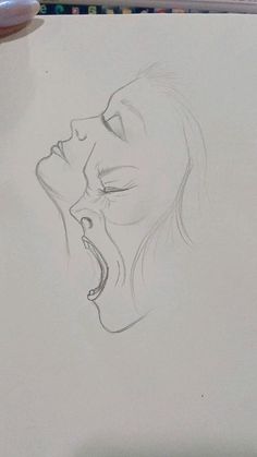 a pencil drawing of a woman's face with her mouth open and tongue out