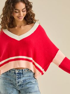 This V-neck varsity crop sweater offers a stylish and comfortable option. Perfect for layering or wearing on its own, it features a classic varsity stripe design. Sc Quotes, Tops Winter, Varsity Sweater, Color Tops, Aesthetic Hoodie, Striped Sweatshirts, Crop Sweater, Red Sweater, Winter Tops