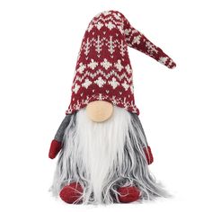 a red and white knitted gnome with long gray hair, wearing a red hat