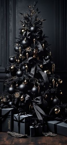 a black christmas tree with presents under it