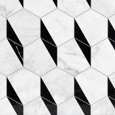 a marble tile with black and white diagonals in the center, on top of each other