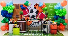 a sports themed party with balloons and decorations