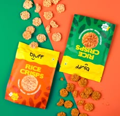 two bags of rice crispes next to each other on a green and orange background