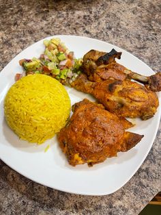 a white plate topped with chicken and rice