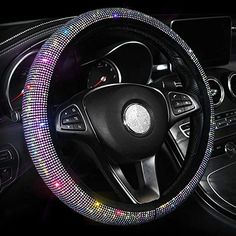 a car steering wheel cover with colorful lights on it