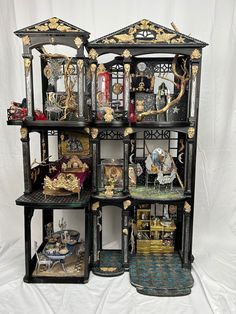 an elaborately decorated shelf with many items on it's sides, including figurines