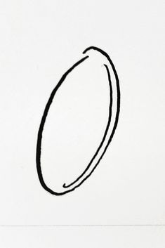 a black and white drawing of an oval object