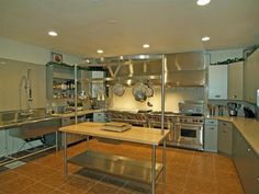 the kitchen is clean and ready for us to use it's stainless steel appliances