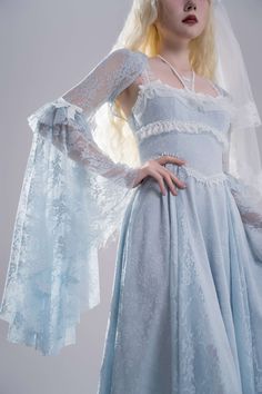 White goth bell sleeves lace shrug. Dress not included.   	 		 			Size 			S 			M 			L 		 		 			Full Length 			21 			22 			23 		 		 			Bust 			88 			92 			96 		 		 			Shoulders 			37 			38 			39 		 		 			Sleeve Length 			83 			84 			85 Blue Lace Dresses, Pastel Goth Dress, Shrug Dress, Vampire Ball, White Goth, Lace Shrug, Thrift Inspo, Shrug For Dresses, Goth Dress