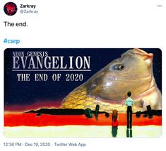 a twitter post with an image of a giant fish on it's head and people standing in front of it