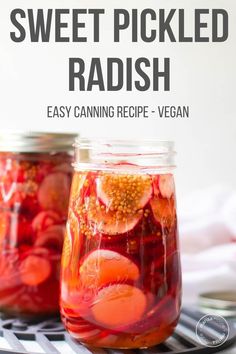 two jars filled with pickled radish sitting on top of a table