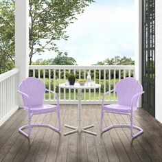 two purple chairs sitting on top of a wooden deck