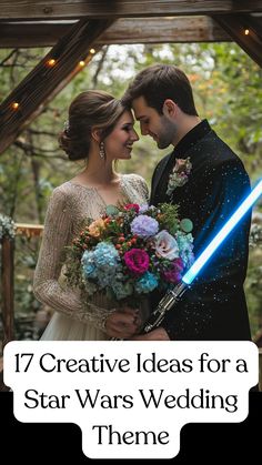 A bride and groom dressed in Star Wars-themed attire, holding lightsaber bouquets, standing under a Star Wars-inspired wedding arch with galaxy-themed decorations. May 4th Wedding, Star Wars Bridal Shower Ideas, Star Wars Vow Renewal, Starwars Wedding Ideas, Elegant Star Wars Wedding, Tasteful Star Wars Wedding, Subtle Star Wars Wedding Ideas, Star Wars Wedding Theme Ideas, Star Wars Wedding Invites