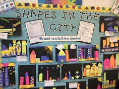 a bulletin board with pictures and writing on it that says shapes in the city, we went on a field trip around