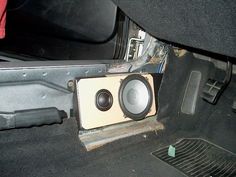 the inside of a car with speakers in it