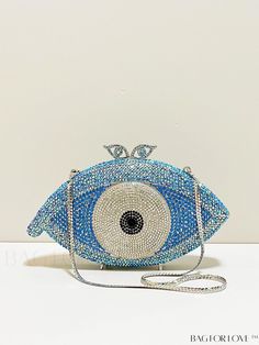 BagForLove - Silver and Blue Crystal Eye Pattern Clutch - Top-Quality Rhinestone Novelty Bag Product Description Color Baby Blue Details Rhinestone Magnetic Yes Strap Type Chain Pattern Type Figure Bag Size Mini Style Glamorous Closure Type Magnet Type Novelty Bag Material Zinc Alloy Composition 20% Polyurethane Care Instructions Do not wash Size Chart INCH CM Bag Height Bag Length Bag Width Strap Length 4.9 inch 7.5 inch 2 inch 19.7 inch Bag Height Bag Length Bag Width Strap Length 12.5 cm 19 cm 5 cm 50 cm Details Pictures Similar Products h2 { text-align: center; } /* æ¢è¡ */ li{ white-space: normal; word-break: break-all; word-wrap: break-word; } .red-box { width: 100%; display: flex; flex-direction: row; flex-wrap: wrap; justify-content: center; } .red-box > div { width: 190px; heigh Blue Rhinestone Clutch Bag, Blue Evening Bag With Rhinestones, Blue Rhinestone Evening Bag, Blue Rhinestone Clutch For Events, Blue Embellished Shoulder Bag For Party, Blue Rhinestone Clutch Evening Bag, Blue Pouch Bag For Events, Eye Pattern, Chain Pattern