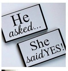 two signs that say he asked she said yes