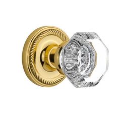 an image of a gold and crystal door knob