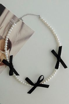 Faux Pearl w/Ribbon Choker - Hand picked by STORETS' stylists Chic White Bow With Ribbon, White Pearl Jewelry With Ribbon, White Ribbon Choker, Elegant Black Ribbon Choker Necklace, Pearl Ribbon Choker, Black Ribbon Choker Necklace, Ribbon Choker, Ivory Color, Faux Pearl