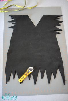 a piece of paper cut out to look like a monster