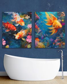 two paintings of goldfish in the water on a blue wall above a bathtub