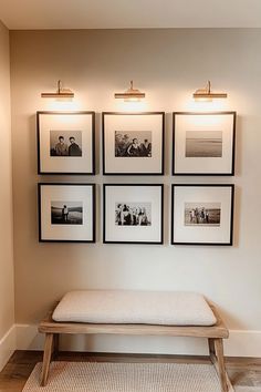 a bench with four pictures hanging on the wall