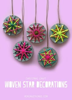 four christmas ornaments made out of paper with the words women star decorations on them in pink and green